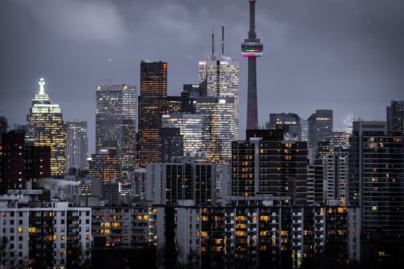 Ranked second: city skyline at dusk with lit towers above the waterfront