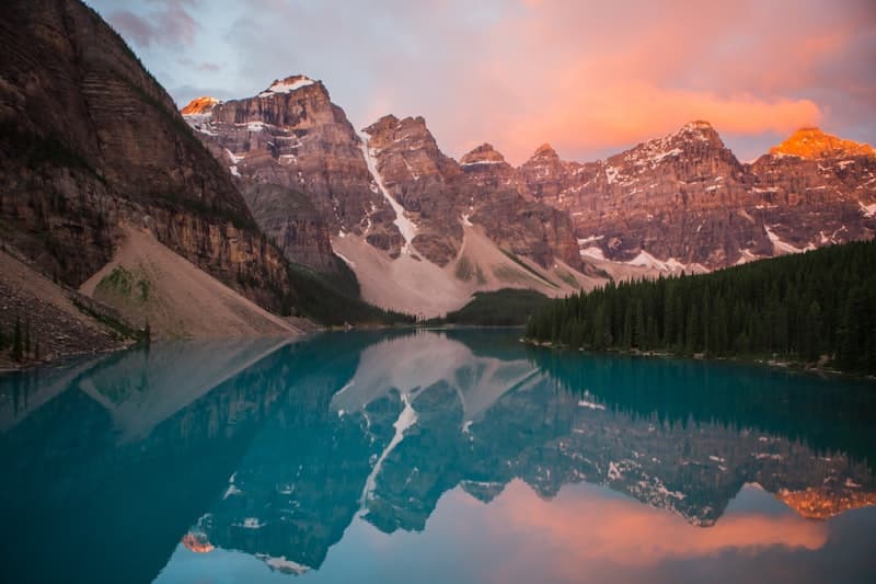 Ranked fifth: turquoise mountain lake at sunrise with snow on the peaks